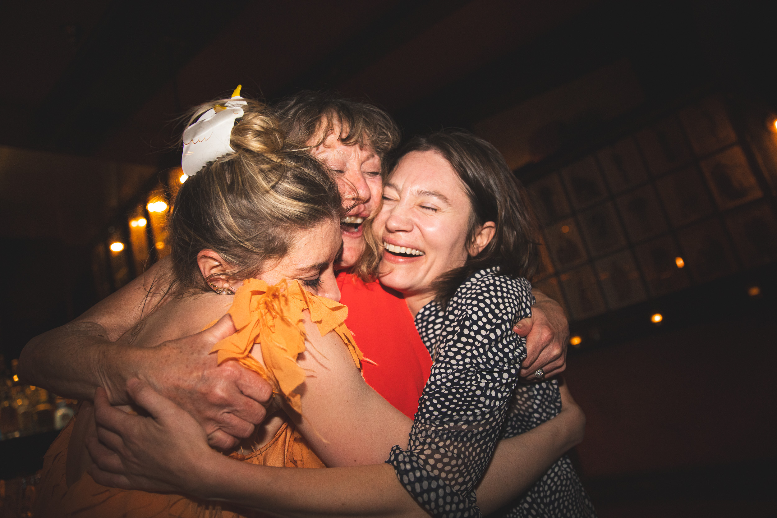 Couple embracing and laughing on dance floor